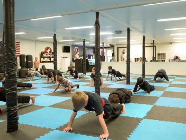 students practicing martial arts techniques in a structured training environment